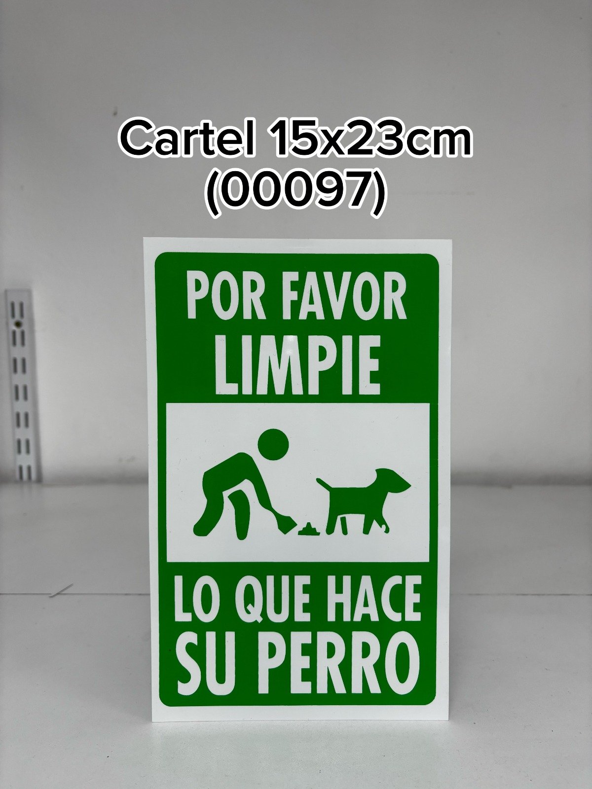 CARTEL POR FAVOR LIMPIE LO QUE HACE SU PERRO (15X23)